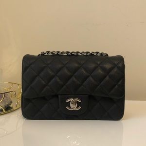 “Chanel” small rectangular black caviar with silver hardware
